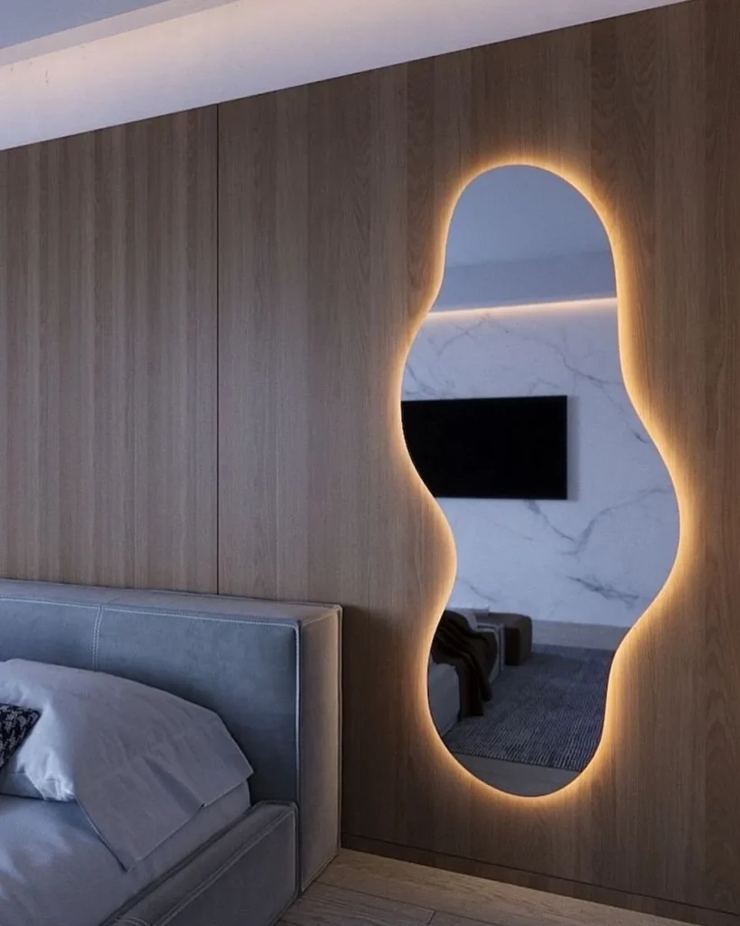 Organic-Shaped Backlit Mirror for Subtle Romance